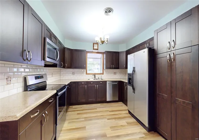 Photo 2 of Single Family Residence at 1 Tammy Ln, Saint Charles, MO 63304 | MLS# MIS24072189 | | Sold on 2025-01-24