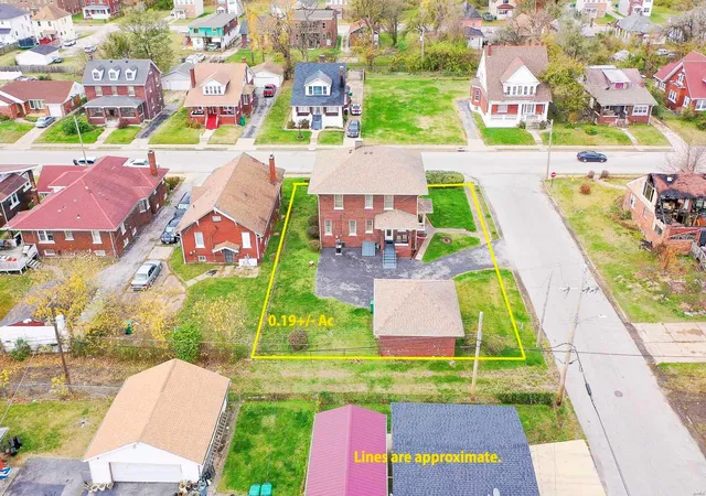 Photo 3 of Single Family Residence at 646 Vogel Pl, East Saint Louis, IL 62205 | MLS# MIS24073964 | | Sold on 2025-02-19