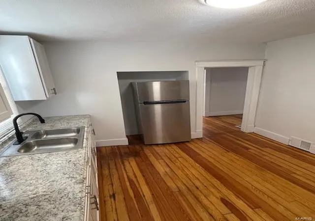 Photo 5 of Single Family Residence at 3327 Dix Ave, Saint Louis, MO 63114 | MLS# MIS24074310 | | Sold on 2025-04-10