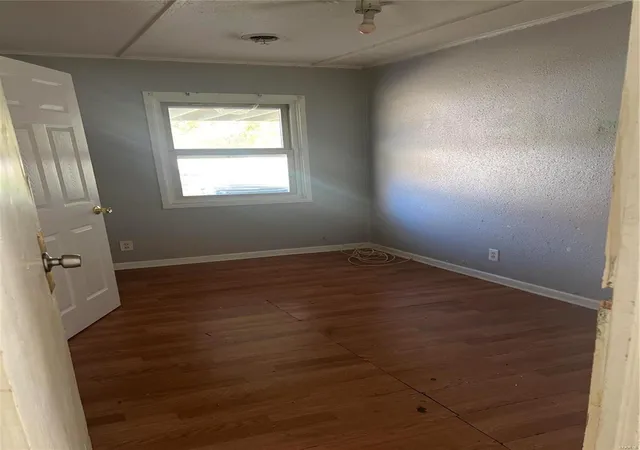 Photo 3 of Single Family Residence at 5320 Grove Ave, Saint Louis, MO 63135 | MLS# MIS24074469 | | Sold on 2024-12-19
