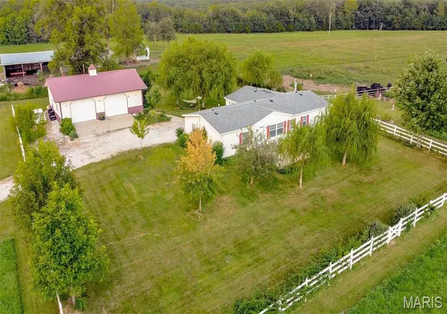 Photo 2 of Manufactured Home at 12974 Monroe Road 633, Santa Fe, MO 65282 | MLS# MIS24075808 | | Sold on 2025-09-04