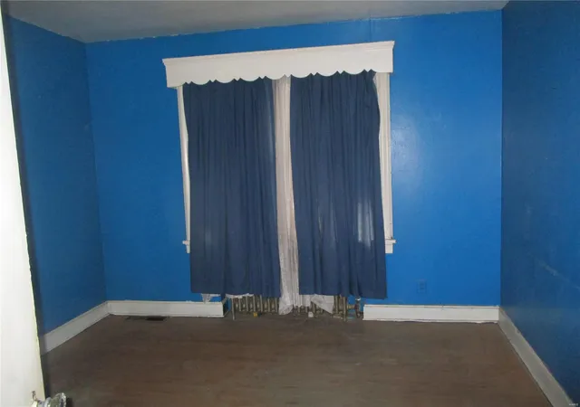 Photo 4 of Single Family Residence at 4561 Carter Ave, Saint Louis, MO 63115 | MLS# MIS24075901 |  | Sold on 2025-02-05