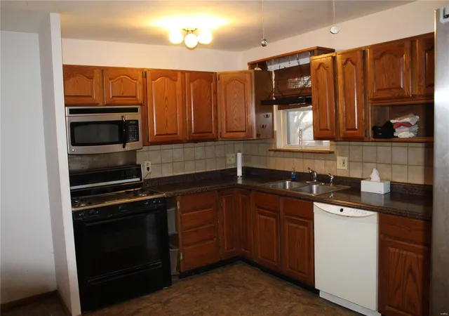 Photo 2 of Single Family Residence at 1716 Korando Ave, Saint Louis, MO 63114 | MLS# MIS24077315 | | Sold on 2025-01-08