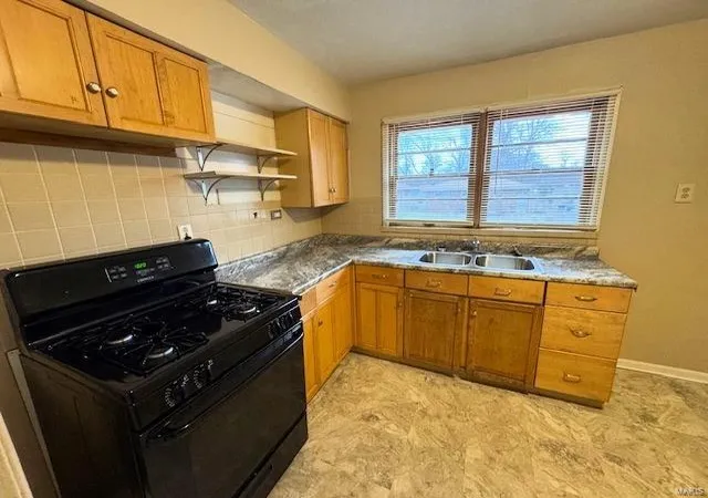 Photo 3 of Single Family Residence at 1201 Walker Ave, Saint Louis, MO 63138 | MLS# MIS24077344 | | Sold on 2025-01-24