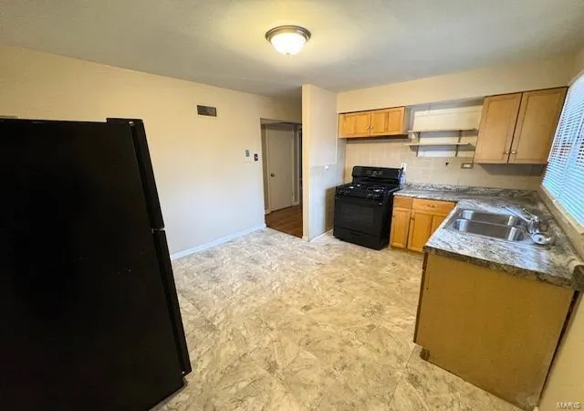 Photo 4 of Single Family Residence at 1201 Walker Ave, Saint Louis, MO 63138 | MLS# MIS24077344 | | Sold on 2025-01-24