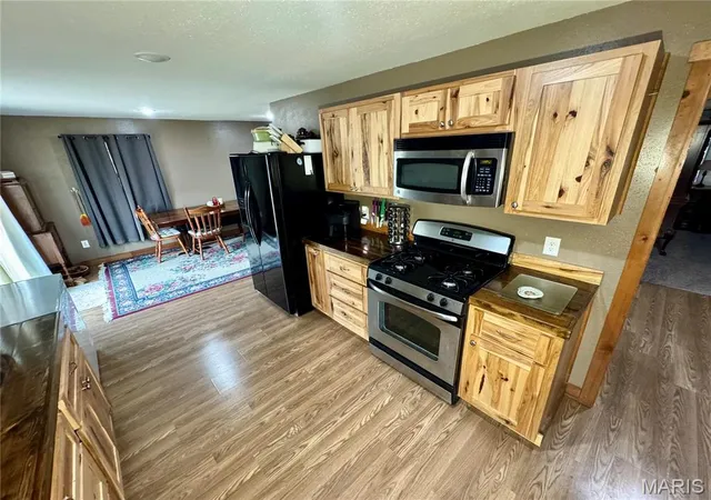 Photo 5 of Single Family Residence at 301 W Summer St, Monroe City, MO 63456 | MLS# MIS24078582 | | Sold on 2025-06-27