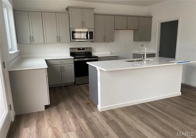 Photo 2 of Townhouse for sale at 7123 Trainor Pl, Saint Louis, MO 63116 | MLS# MIS25000590 | Listing updated on 2026-07-13