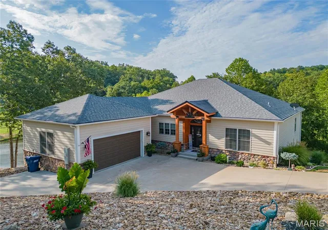 Photo 1 of Single family home for sale at 4 Isleworth Ave, Lake Ozark, MO 65049 | MLS# MIS25002528 | Listing updated on 2025-07-23