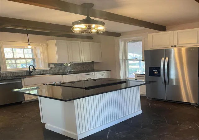 Photo 3 of Single Family Residence at 610 W Main St, Fredericktown, MO 63645 | MLS# MIS25004043 | | Sold on 2025-05-21