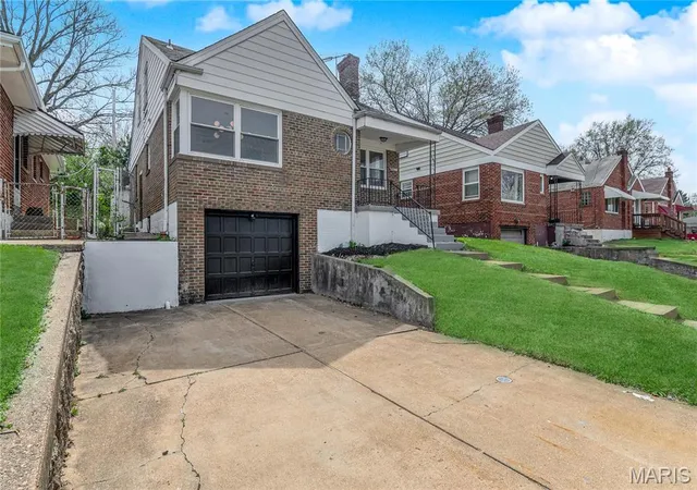 Photo 2 of Single Family Residence at 8912 Goodfellow Blvd, Saint Louis, MO 63147 | MLS# MIS25009325 | | Sold on 2025-06-06