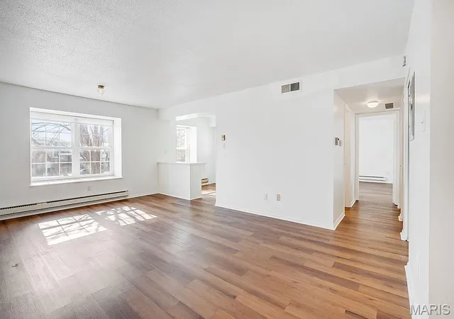 Condo for sale at 1673 Herault Pl #E, Saint Louis, MO 63125 | MLS# MIS25011814 | Listing updated on 2025-07-15