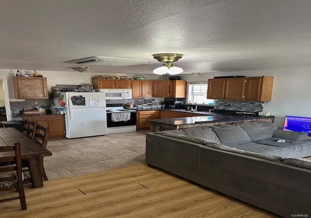 Photo 5 of Single Family Residence at 776 Cyrus Dr, Macks Creek, MO 65786 | MLS# MIS25012429 | | Sold on 2025-05-27
