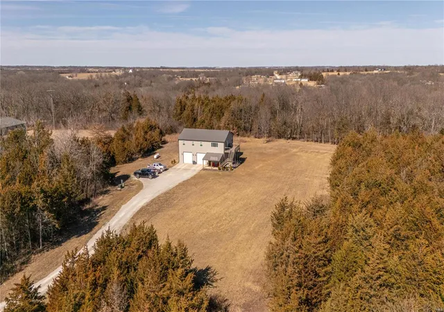 Photo 1 of Single Family Residence at 14822 Cedar Cove Pl, New London, MO 63459 | MLS# MIS25012512 |  | Sold on 2025-07-11