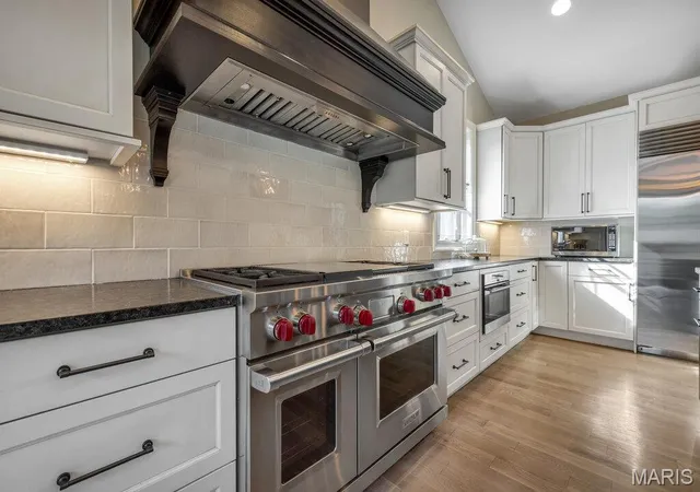 Photo 3 of Single Family Residence at 8311 Kingsbury Blvd, Saint Louis, MO 63105 | MLS# MIS25017183 | | Sold on 2025-06-02