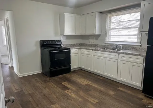 Photo 4 of Single Family Residence at 319 Reasor Dr, Saint Louis, MO 63135 | MLS# MIS25017547 | | Sold on 2025-05-02