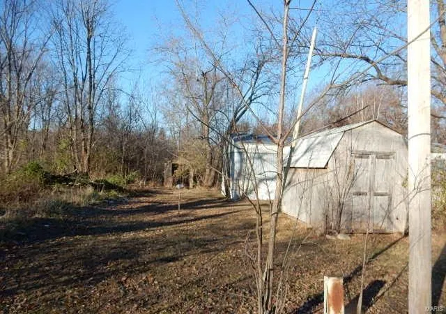 Photo 5 of Single Family Residence at 103 N Roosevelt St, Bellflower, MO 63333 | MLS# MIS25019567 | | Sold on 2025-04-30