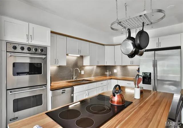 Photo 4 of Single Family Residence at 7414 Bruno Ave, Saint Louis, MO 63117 | MLS# MIS25020122 | | Sold on 2025-05-23