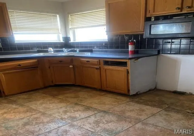 Photo 2 of Single Family Residence at 12001 Victorian Village Ct, Saint Louis, MO 63138 | MLS# MIS25020790 |  | Sold on 2025-05-30