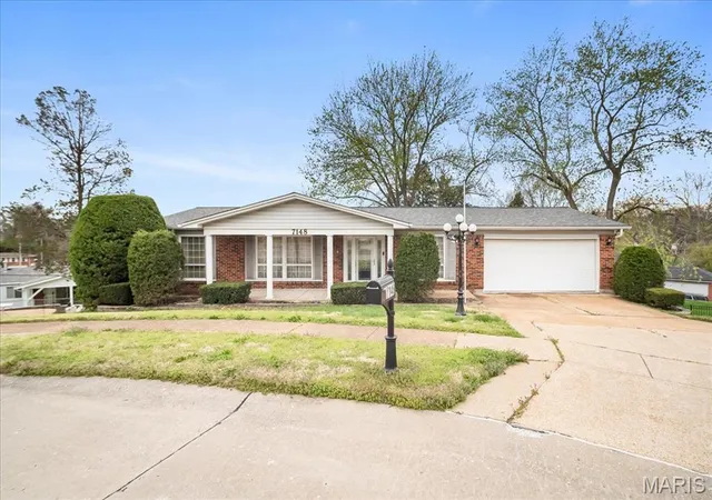 Photo 3 of Single Family Residence at 7148 Hollymont Dr, Saint Louis, MO 63123 | MLS# MIS25022855 |  | Sold on 2025-06-18
