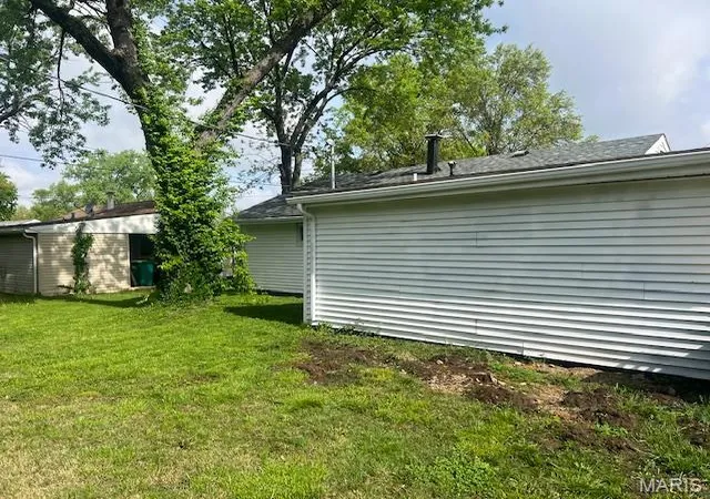 Photo 2 of Single Family Residence at 7812 Atherstone Dr, Saint Louis, MO 63121 | MLS# MIS25024749 | | Sold on 2025-06-10