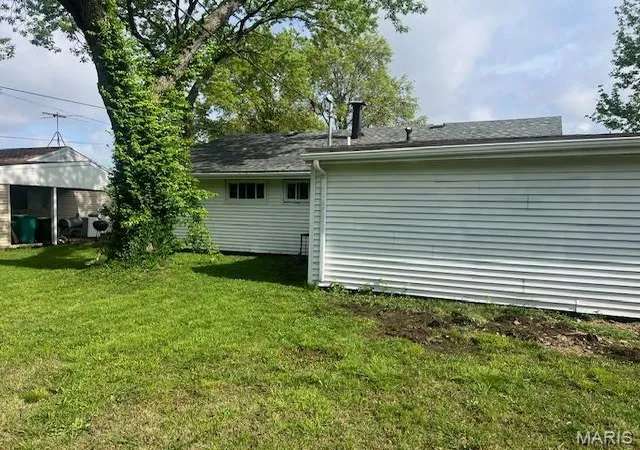 Photo 3 of Single Family Residence at 7812 Atherstone Dr, Saint Louis, MO 63121 | MLS# MIS25024749 | | Sold on 2025-06-10