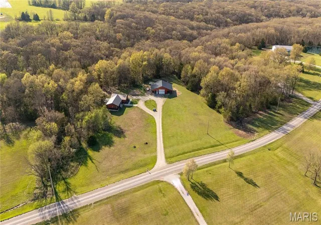 Photo 1 of Single Family Residence at 22261 Coyote Hills Dr, Center, MO 63436 | MLS# MIS25025217 | | Sold on 2025-05-30