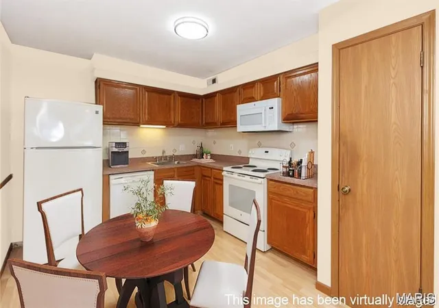 Photo 2 of Condominium at 7416 Triwoods Dr #A, Saint Louis, MO 63119 | MLS# MIS25025238 | | Sold on 2025-10-22