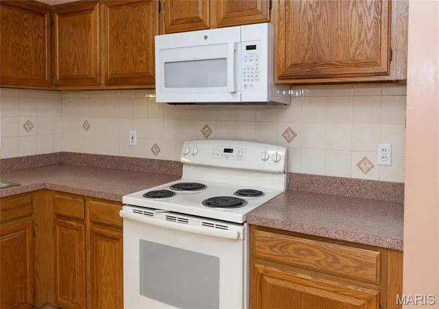 Photo 3 of Condominium at 7416 Triwoods Dr #A, Saint Louis, MO 63119 | MLS# MIS25025238 | | Sold on 2025-10-22