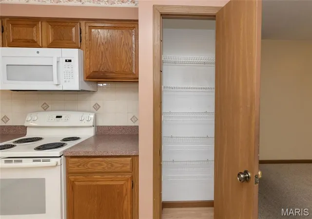 Photo 4 of Condominium at 7416 Triwoods Dr #A, Saint Louis, MO 63119 | MLS# MIS25025238 | | Sold on 2025-10-22