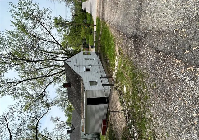 Photo 4 of Single Family Residence at 10140 Mayfair Dr, Saint Louis, MO 63136 | MLS# MIS25025701 | | Sold on 2025-08-22