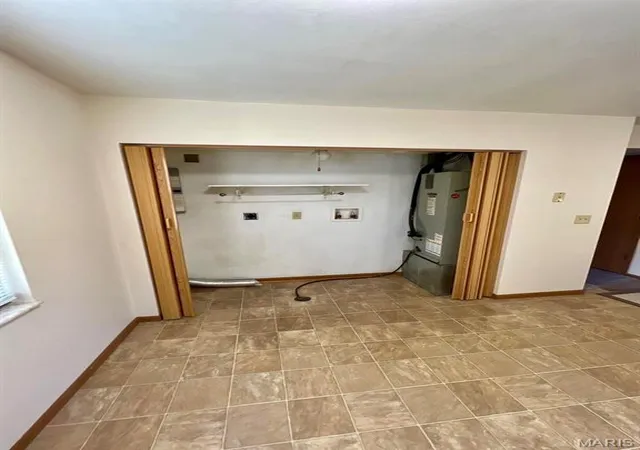 Photo 4 of Multi Family at 403 Emmons Ave, Saint Charles, MO 63301 | MLS# MIS25030738 | | Sold on 2025-06-12