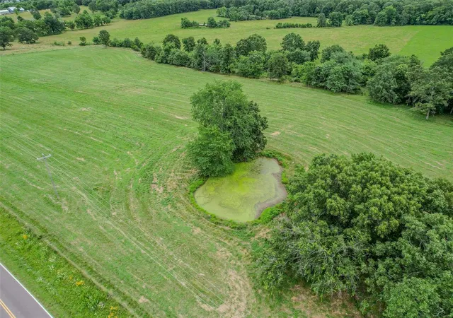Photo 2 of Land for sale at 658 W State Rd H, Stoutland, MO 65567 | MLS# 24041979 | Listing updated on 2024-12-16