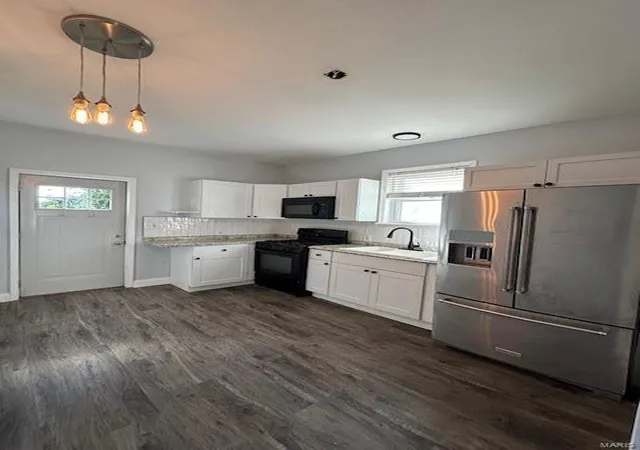Photo 3 of Single family home for sale at 5908 W Park Ave, Saint Louis, MO 63110 | MLS# 24063943 | Listing updated on 2024-11-21