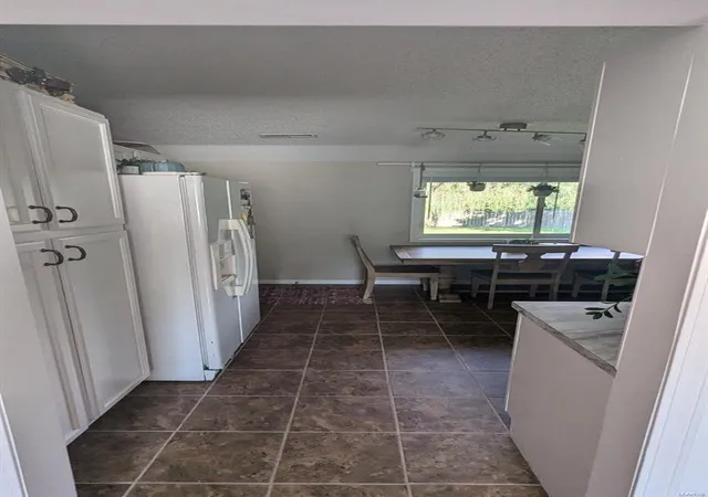 Photo 3 of Single family home for sale at 609 Fox Crk Rd, Rolla, MO 65401 | MLS# 24069847 | Listing updated on 2024-12-18