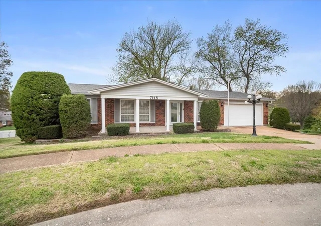 Photo 2 of Single family home for sale at 7148 Hollymont Dr, Saint Louis, MO 63123 | MLS# 25022855 | Listing updated on 2025-04-11
