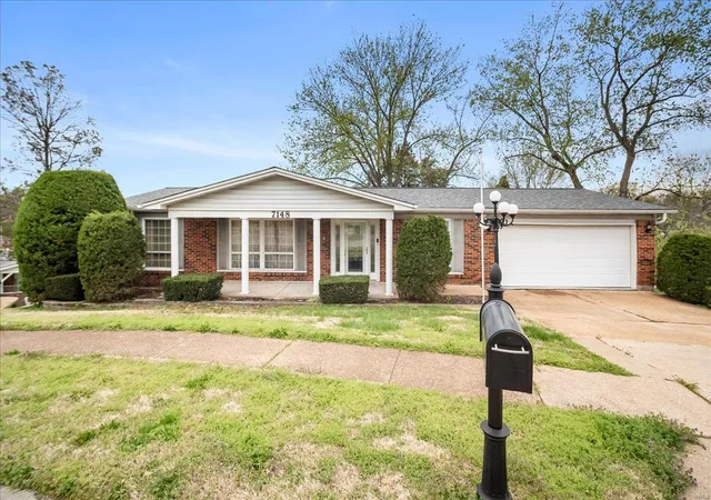 Photo 3 of Single family home for sale at 7148 Hollymont Dr, Saint Louis, MO 63123 | MLS# 25022855 | Listing updated on 2025-04-11