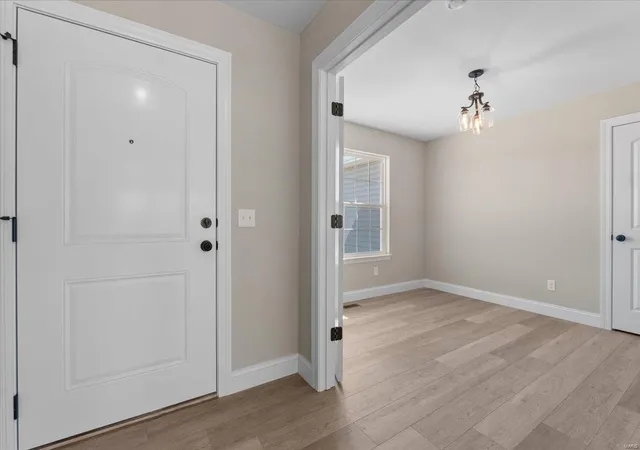 Photo 4 of Single family home for sale at 1423 Wild Ridge Ests Ct, Florissant, MO 63033 | MLS# 25023430 | Listing updated on 2025-04-16