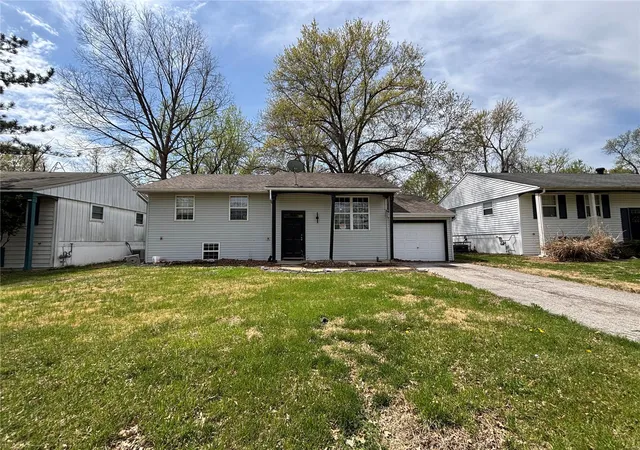 Photo 1 of Single family home for sale at 1428 Columbus Dr, Saint Louis, MO 63138 | MLS# 25024346 | Listing updated on 2025-04-21