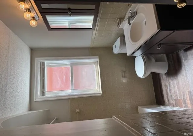 Photo 3 of Multi family home for sale at 8745 Riverview Blvd #2, Saint Louis, MO 63147 | MLS# 25024727 | Listing updated on 2025-04-21