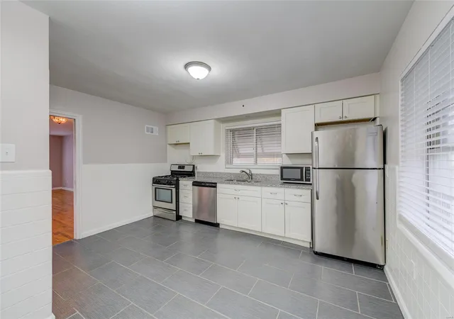 Photo 4 of Multi family home for sale at 7155 Tulane Ave, Saint Louis, MO 63130 | MLS# 25028663 | Listing updated on 2025-05-01