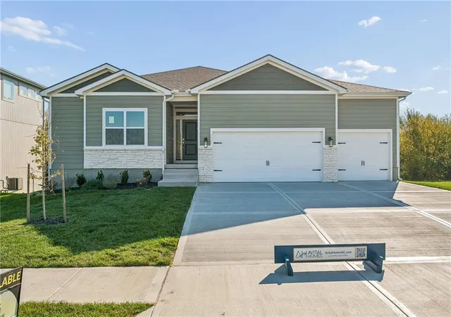 Single family home for sale at 901 Reed Dr, Raymore, MO 64083 | MLS# 2551755
