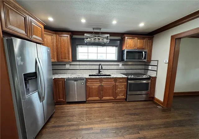 Photo 3 of Single family home for sale at 3816 Flora Ave, Kansas City, MO 64109 | MLS# 2576474 | Listing updated on 2026-10-13