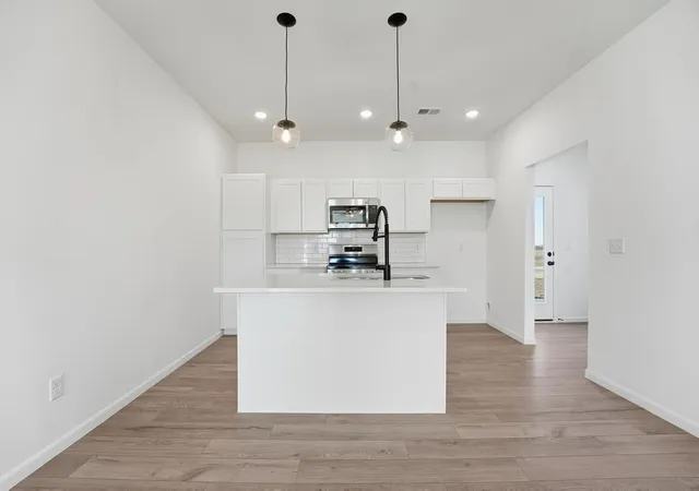 Photo 3 of Townhouse for sale at 27317 Acacia Dr, Lee's Summit, MO 64086 | MLS# 2592793 | Listing updated on 2026-09-30