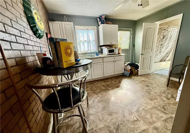 Listing Photo 2 - Condo for sale in building located at 1213 W Main St, Richmond, MO 64085 - Unit #