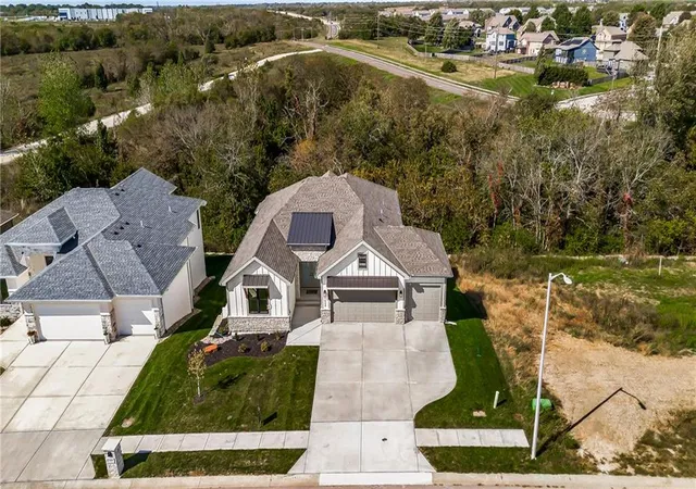 Single family home for sale at 1408 Larkspur Pl, Raymore, MO 64083 | MLS# 2600638