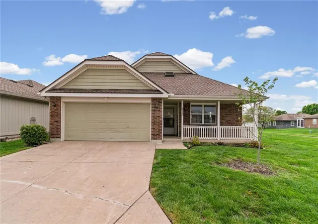 1st image of 515 S Saturn Dr, Raymore, MO 64083 | MLS# 2603468