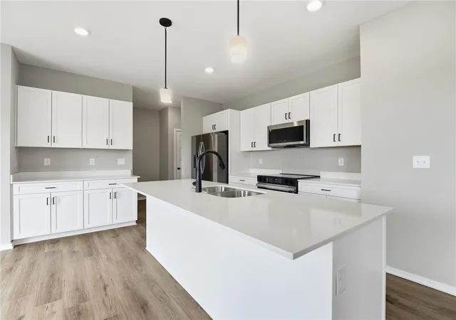 Photo 2 of Single family home for sale at 1011 Camelback Ct, Raymore, MO 64083 | MLS# 2605829 | Listing updated on 2026-10-20