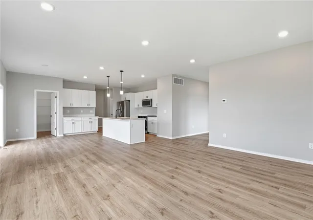 Photo 3 of Single family home for sale at 1011 Camelback Ct, Raymore, MO 64083 | MLS# 2605829 | Listing updated on 2026-10-20
