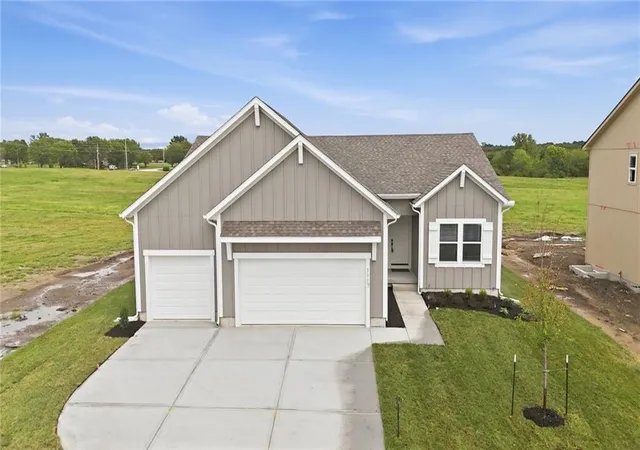 Single family home for sale at 1117 Sendera Trl, Raymore, MO 64083 | MLS# 2605897