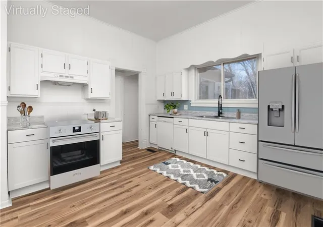 Photo 2 of Single family home for sale at 301 E Mitchell St, Marshall, MO 65340 | MLS# 2606751 | Listing updated on 2026-10-01